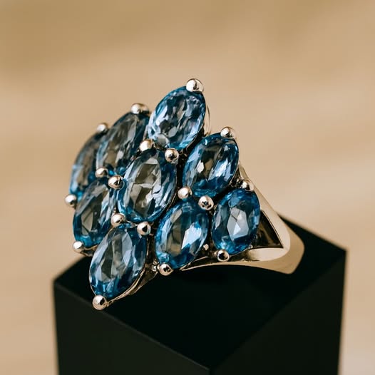 Blue that speaks to your soul 💙 Eight shimmering topaz gems, set in sterling silver, capturing light, emotion, and elegance in every glance.