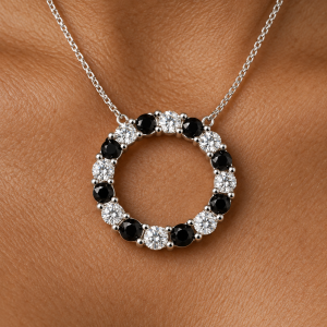 Black and clear stone silver pendant