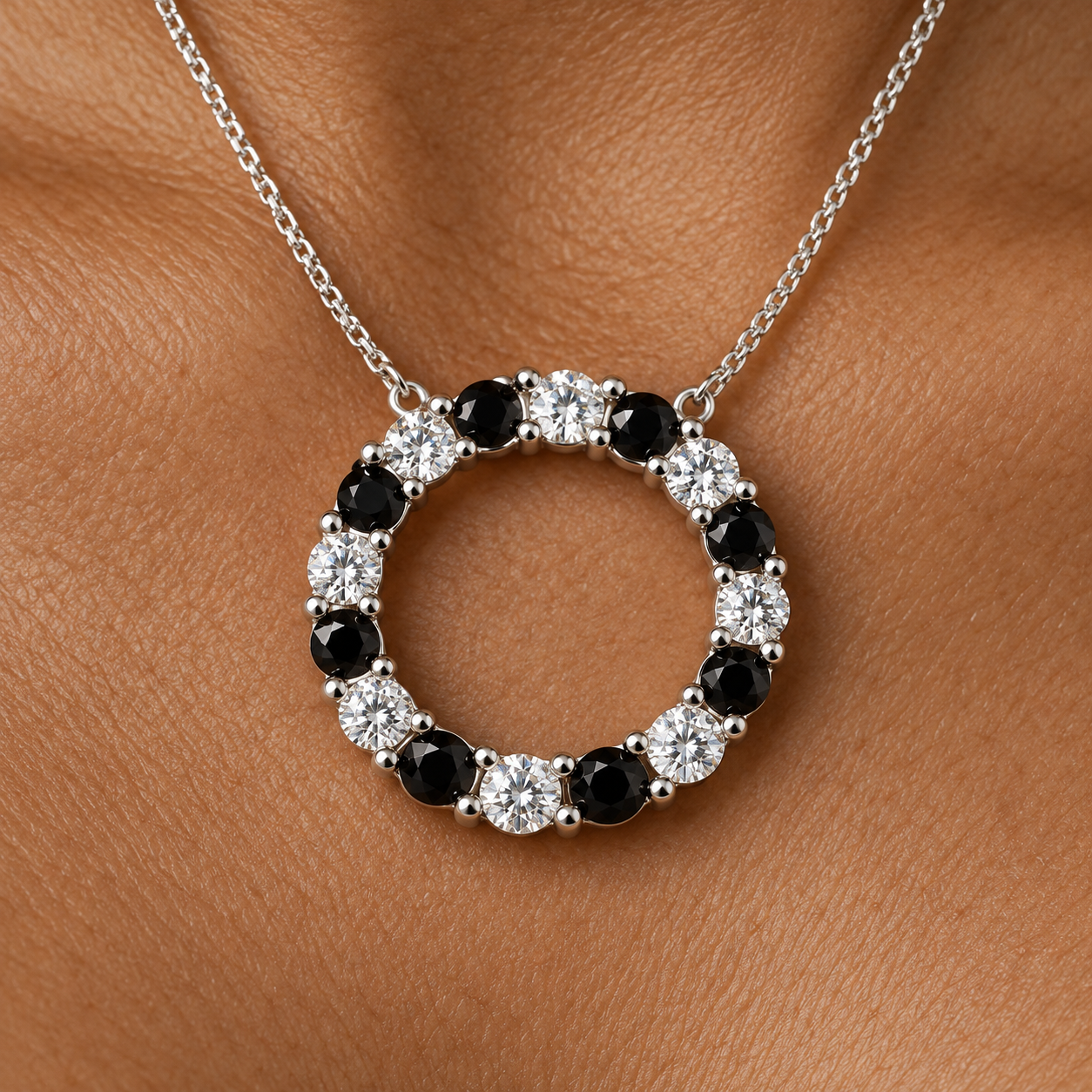 Black and clear stone silver pendant